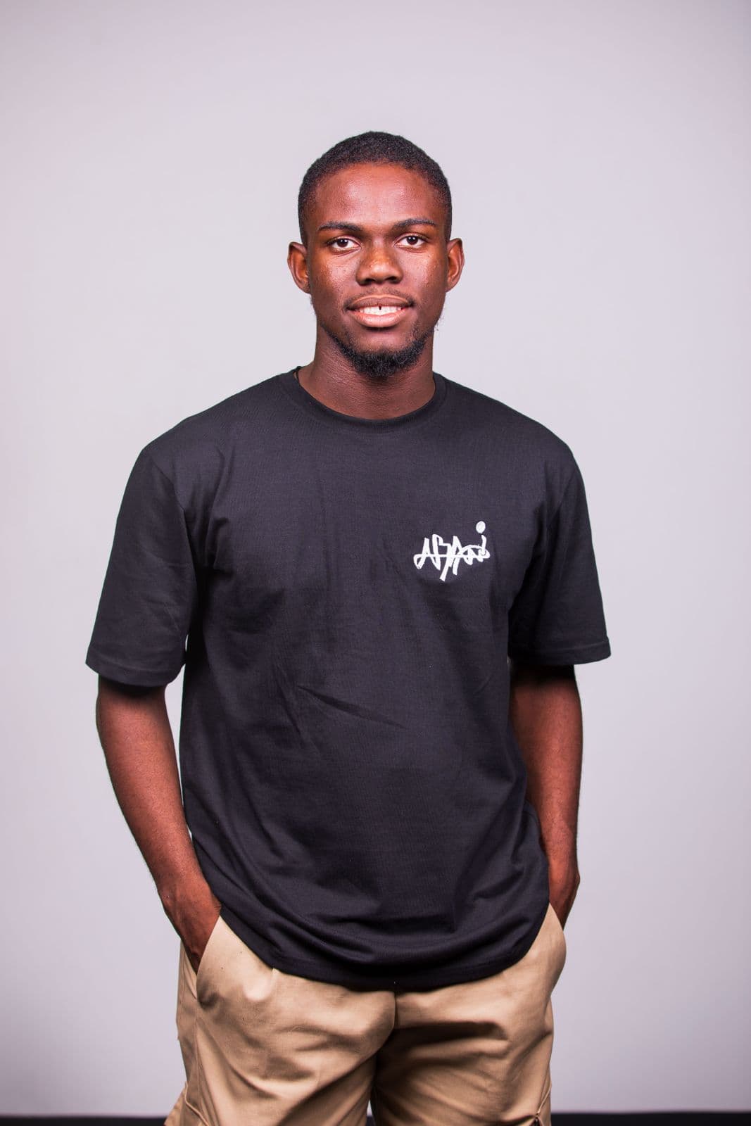 Chudi Ofoma smiling at the camera